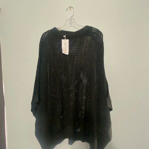 Black Shrug with Relaxed Fit and Knitted Texture